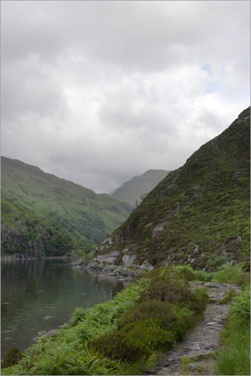 Nearing Kinloch Hourn on the footpath from Barisdale, in the evening of a gloomy day