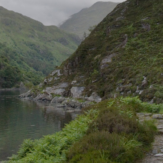 Zoom: Nearing Kinloch Hourn on the footpath from Barisdale, in the evening of a gloomy day