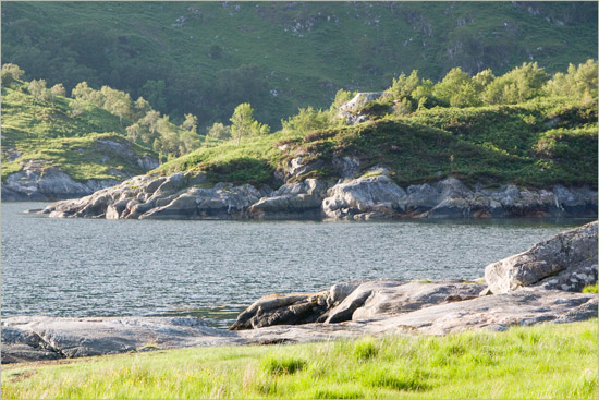 Eilean Mhogh-sgeir in the early evening sun, as seen from Runeval