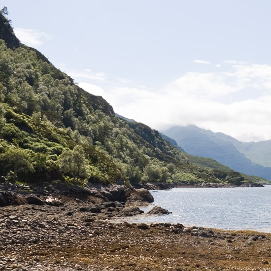 Zoom: A summer afternoon's view West over Loch Hourn from Runeval