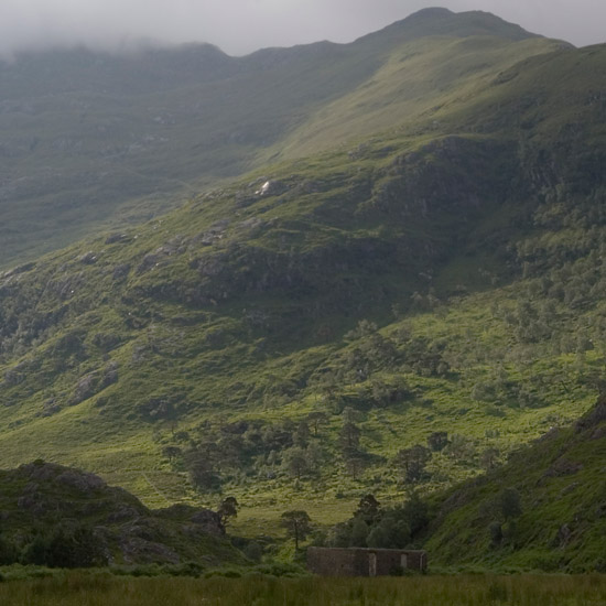 Sgurr a' Choire-bheithe under a cloud, over the ruins of Ambraigh at Barisdale