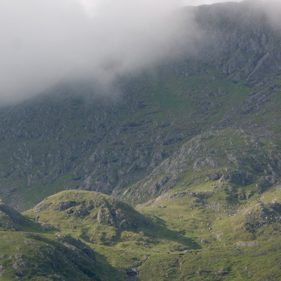 The lethal North face of Luinne Bheinn's summit in morning mist, as seen from way down on the Barisdale plain