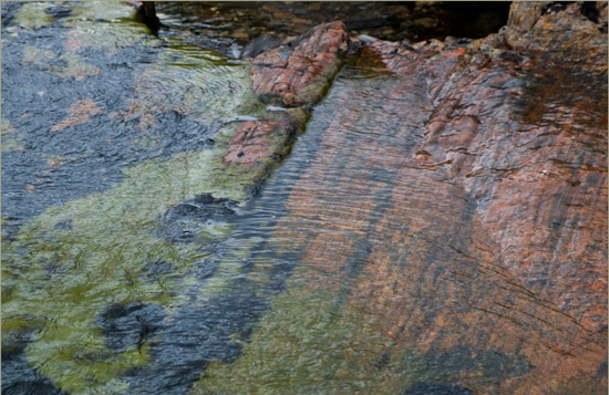 The liquid colours of gloom; Abhainn Chòsaidh's upper course on a very dark afternoon