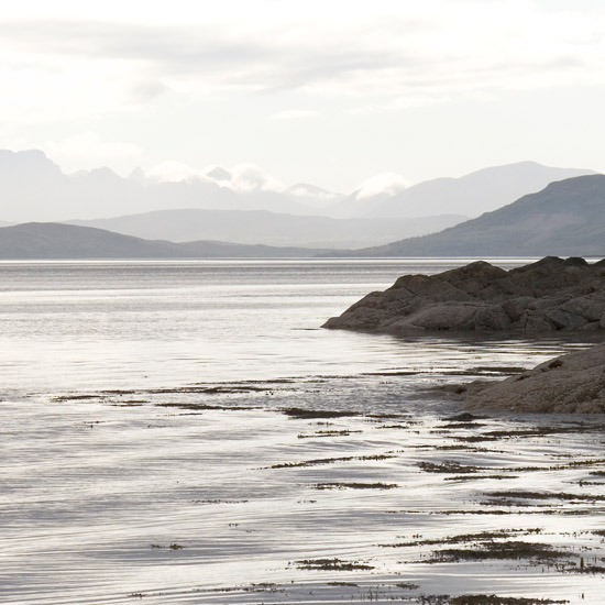 One quiet evening, adrift on outer Loch Hourn with a view of Skye